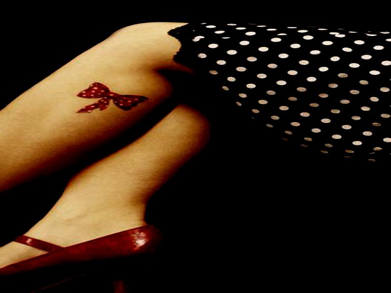 tattoo mujer en la pierna